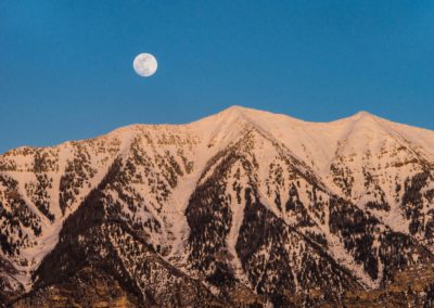 Full moon above Cascade Mountain